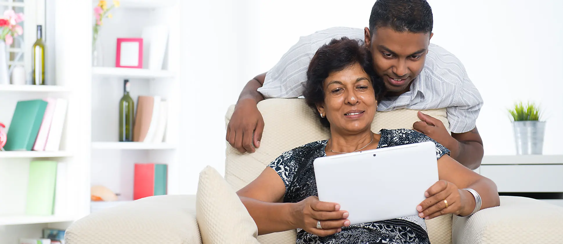 mother and son planning on computer